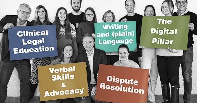 Several of CELLs (former) members holding posters saying "Clinical Legal Education", "Writing and (plain) Language", "The Digital Pillar", "Verbal Skills & Advocacy", and "Dispute Resolution".