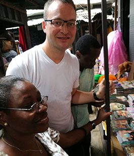 Erlend Paasche and his local consultant at a street market.