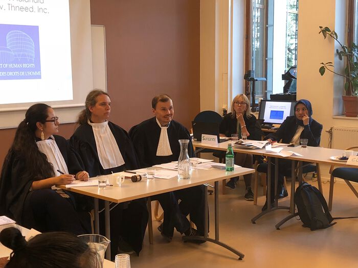 The moot court judges consider the case